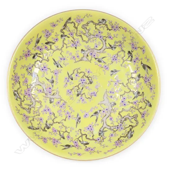 A Chinese porcelain famille rose yellow ground 'magpie' dish,