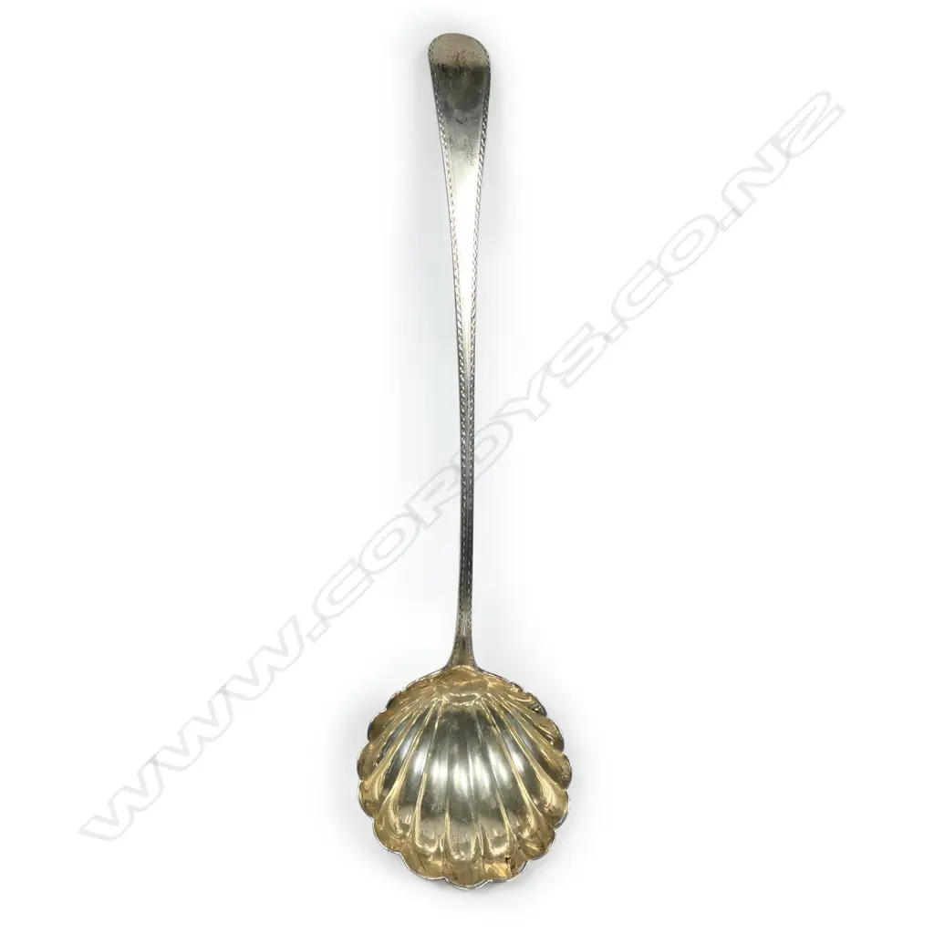 A George III silver soup ladle, Image 1++