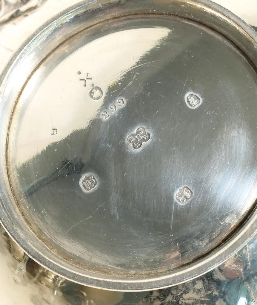 A Victorian silver compressed spherical teapot, Image 1++