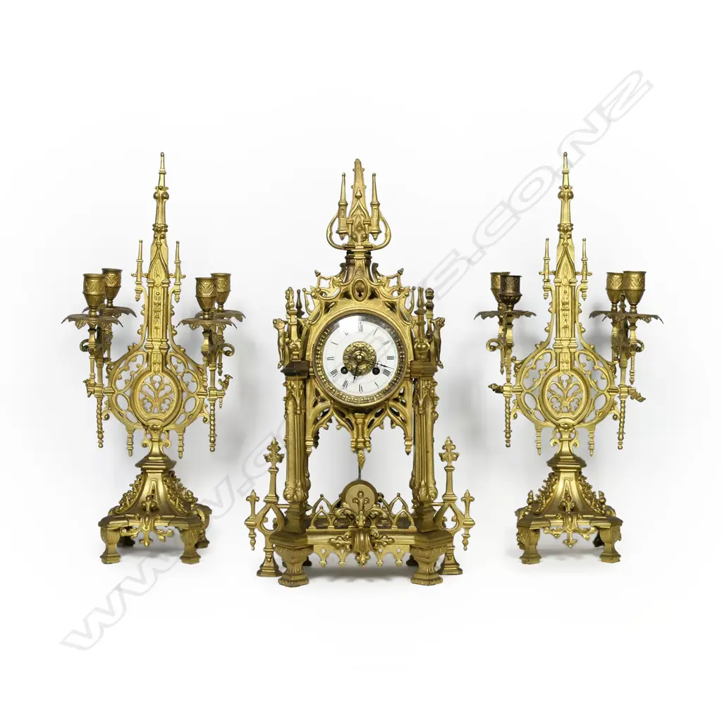 A 19thC French three-piece gilt metal clock garniture set, Image 1++