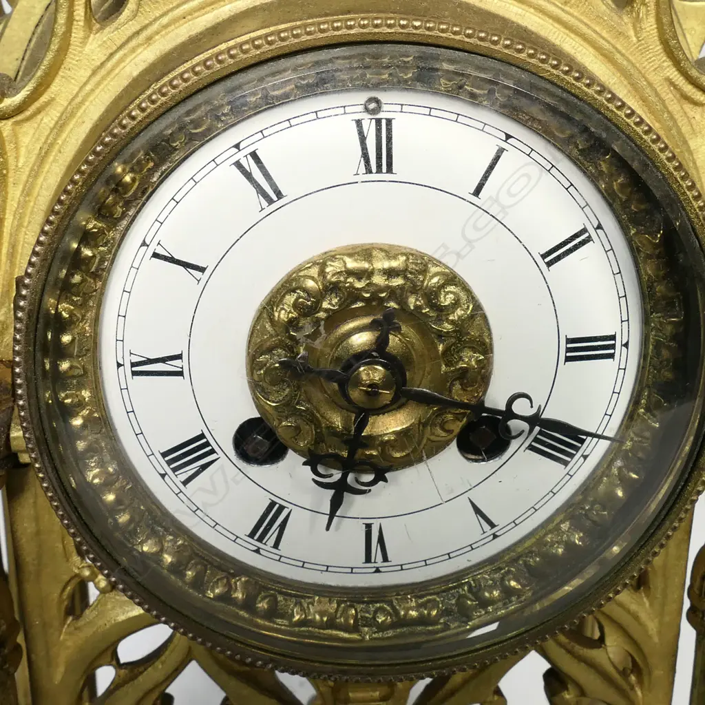 A 19thC French three-piece gilt metal clock garniture set, Image 1++