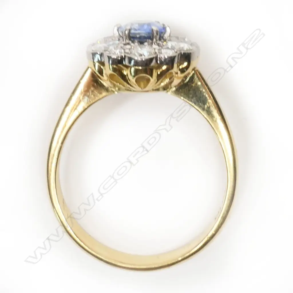 A Peter Minturn design 18ct gold sapphire and diamond cluster ring, Image 1++