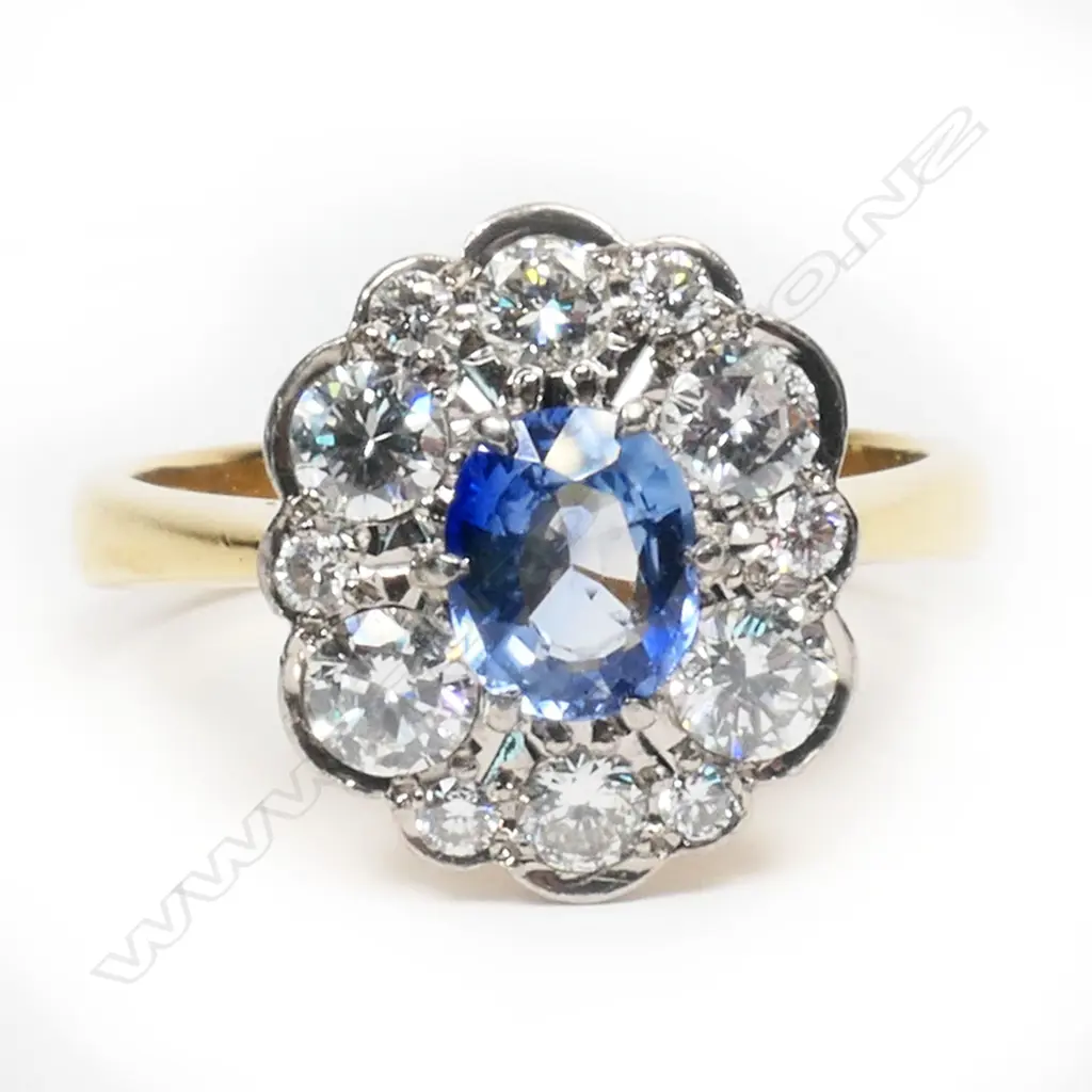 A Peter Minturn design 18ct gold sapphire and diamond cluster ring, Image 1++