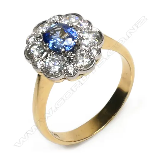 A Peter Minturn design 18ct gold sapphire and diamond cluster ring,