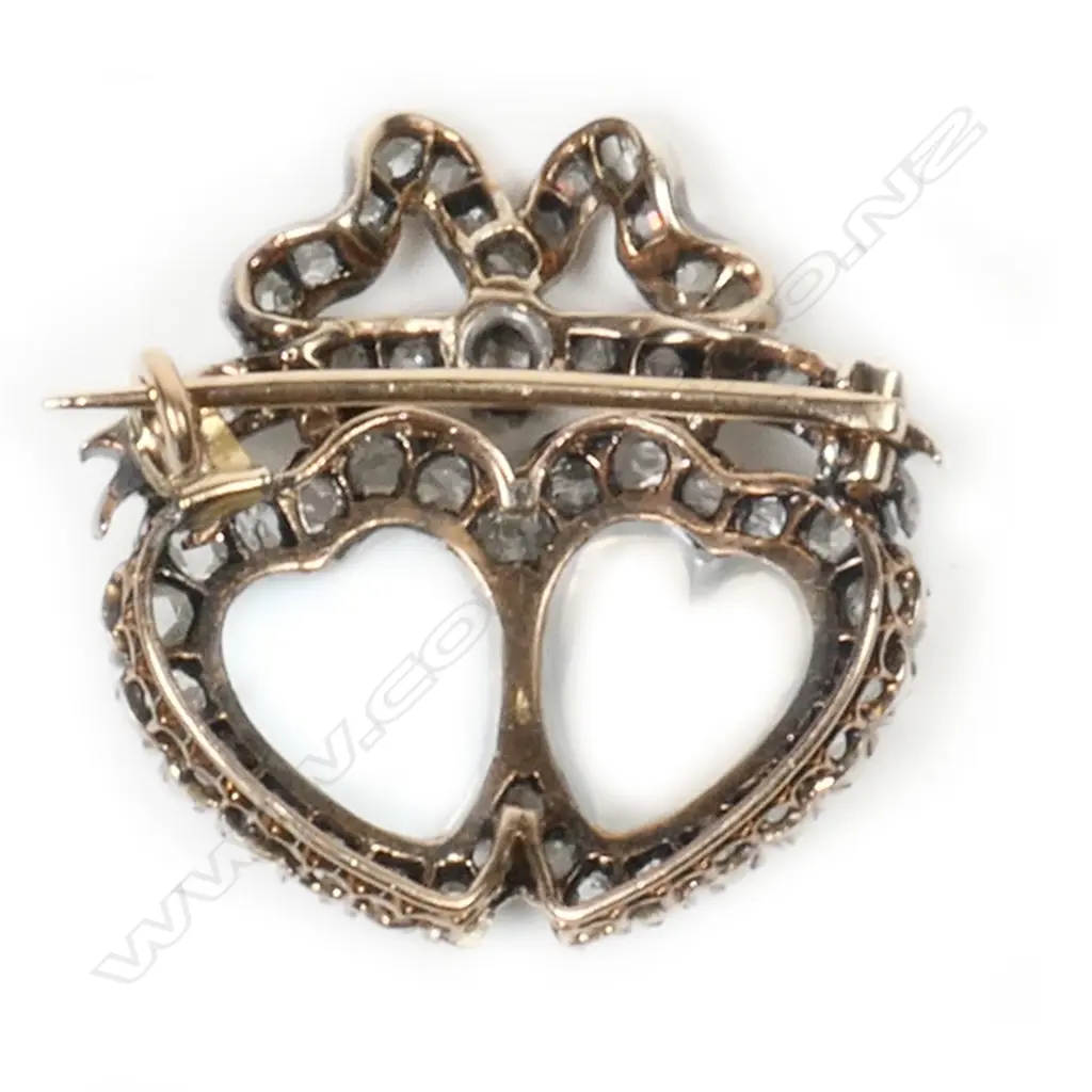 A Victorian 9ct gold and silver diamond and moonstone entwined heart brooch, Image 1++