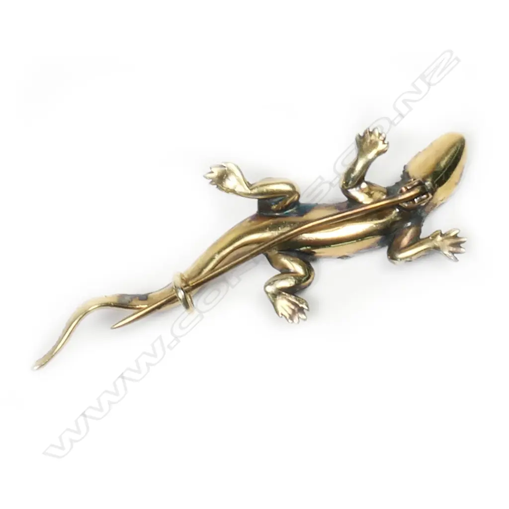 A silver gilt diamond and ruby set lizard brooch, Image 1++