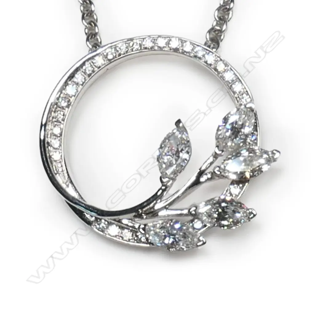 An 18ct white gold and diamond pendant necklace, Image 1++