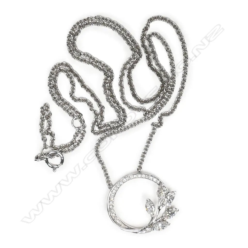 An 18ct white gold and diamond pendant necklace, Image 1++