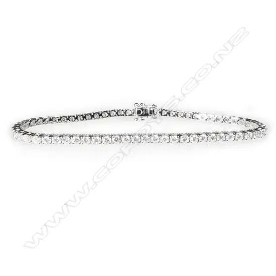 An 18ct white gold and diamond tennis bracelet,