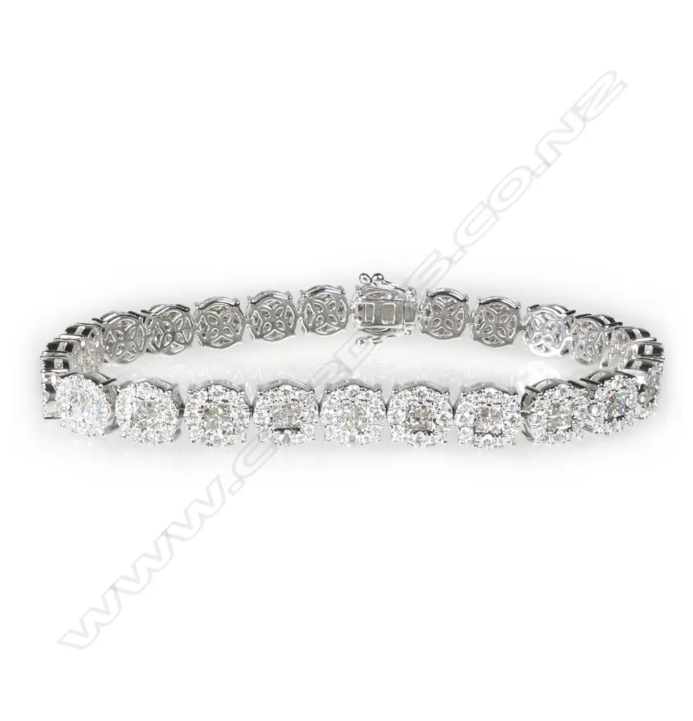 An impressive18ct white gold and diamond multi diamond cluster bracelet, Image 1++
