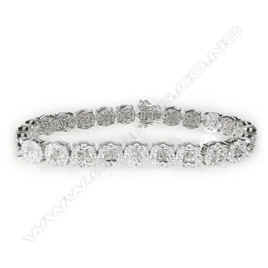 An impressive18ct white gold and diamond multi diamond cluster bracelet,