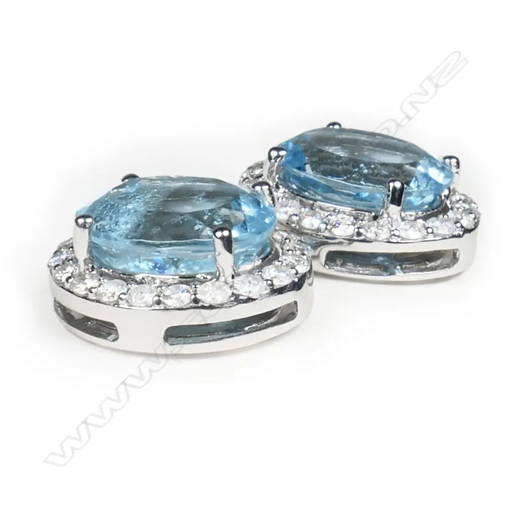 A pair of 14ct white gold, aquamarine and diamond stud earrings, Image 1++