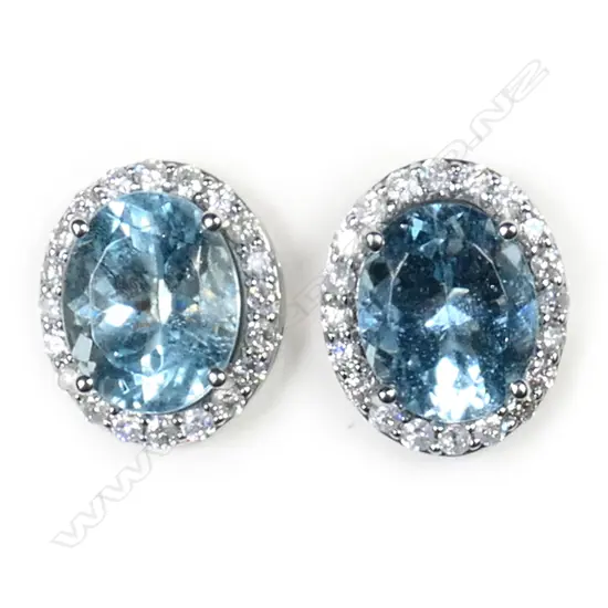 A pair of 14ct white gold, aquamarine and diamond stud earrings,