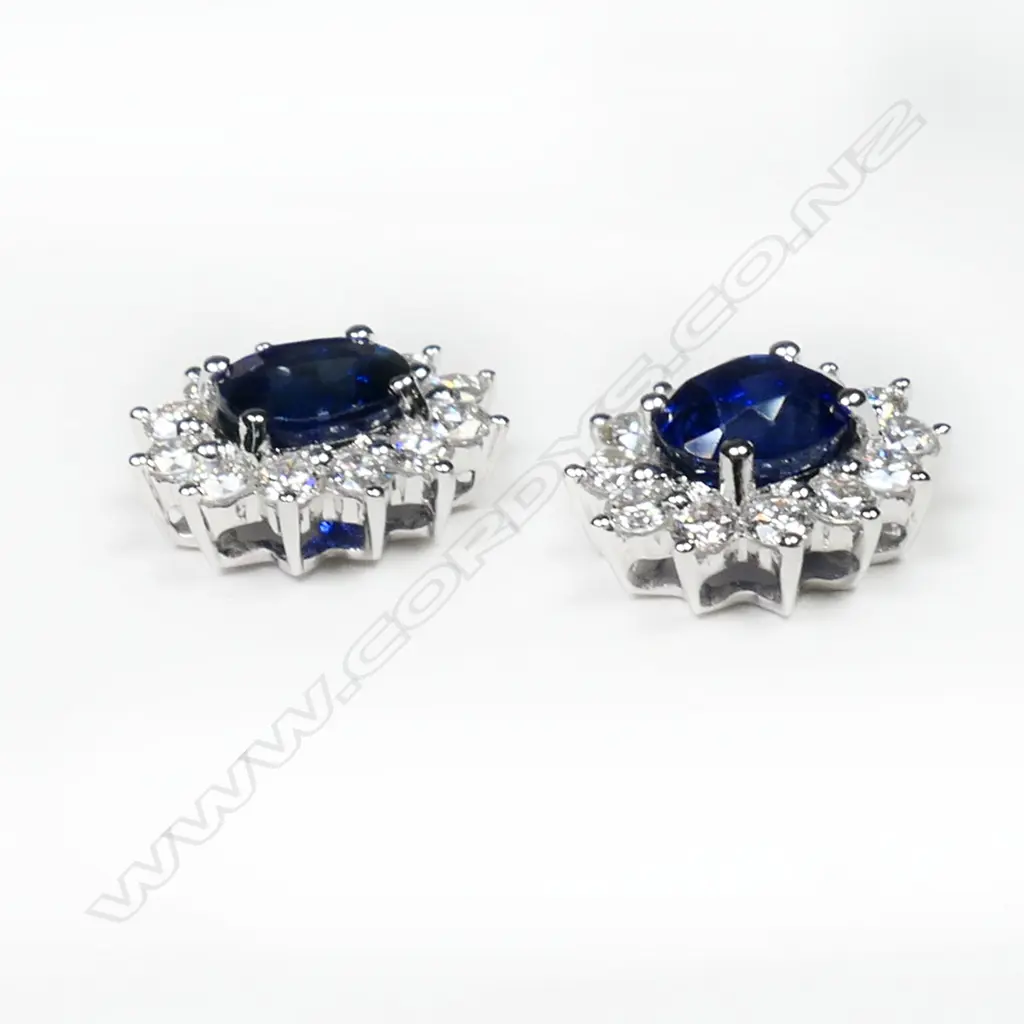 A pair of 18ct white gold diamond and sapphire earrings, Image 1++