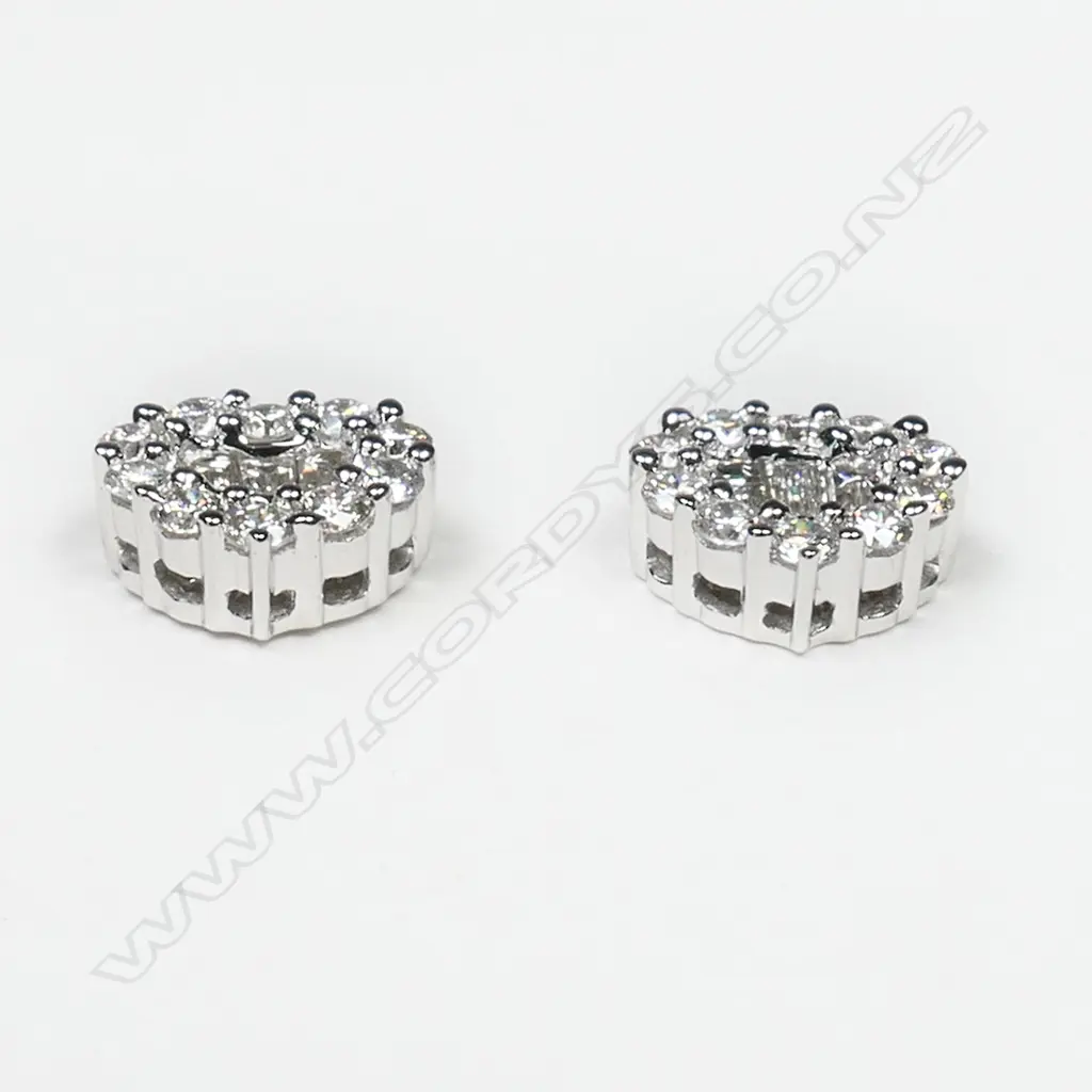 A pair of 18ct white gold and diamond heart shaped cluster earrings, Image 1++