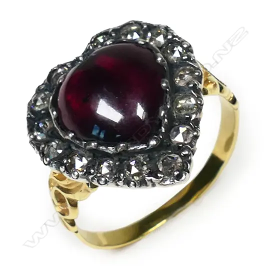 A 14ct yellow gold garnet and diamond ring,