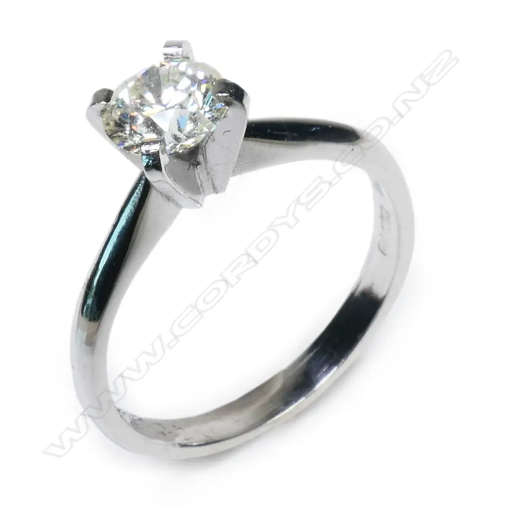 An 18ct white gold and diamond solitaire ring, Image 1++
