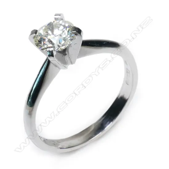 An 18ct white gold and diamond solitaire ring,