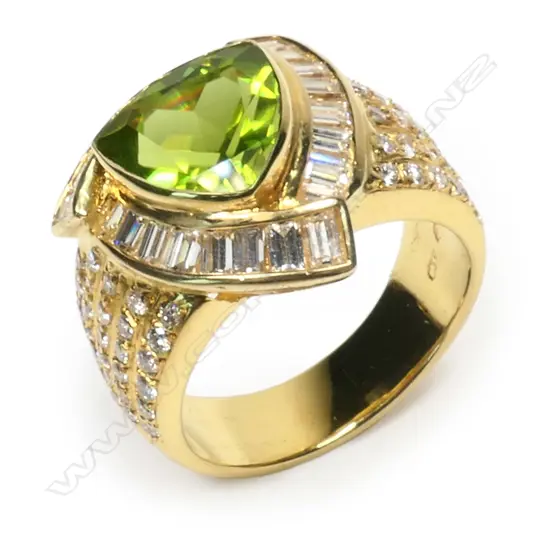 An 18ct gold, peridot and diamond ring,