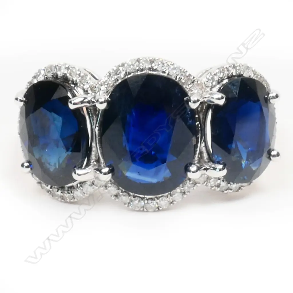 A 14ct white and rose gold, sapphire and diamond trilogy ring, Image 1++