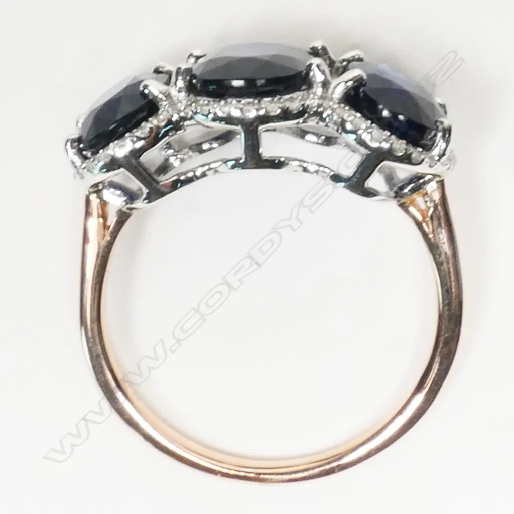 A 14ct white and rose gold, sapphire and diamond trilogy ring, Image 1++