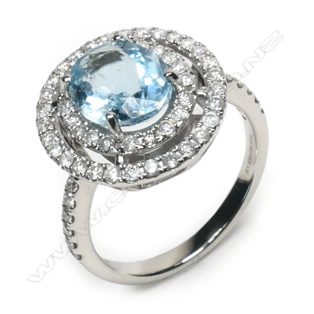 A 14ct white gold, aquamarine and diamond double halo ring, Image 1++