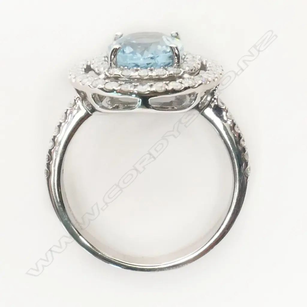 A 14ct white gold, aquamarine and diamond double halo ring, Image 1++