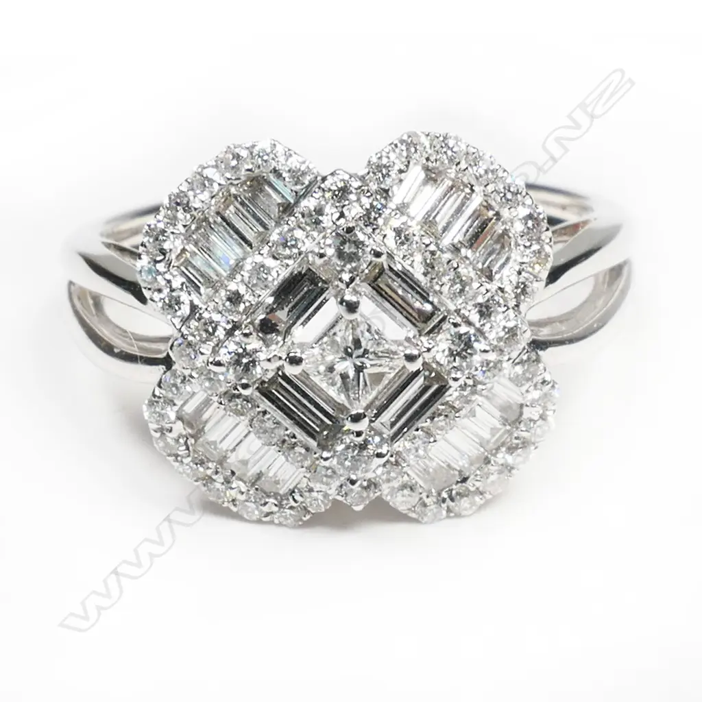 An 18ct white gold and multi diamond ring, Image 1++