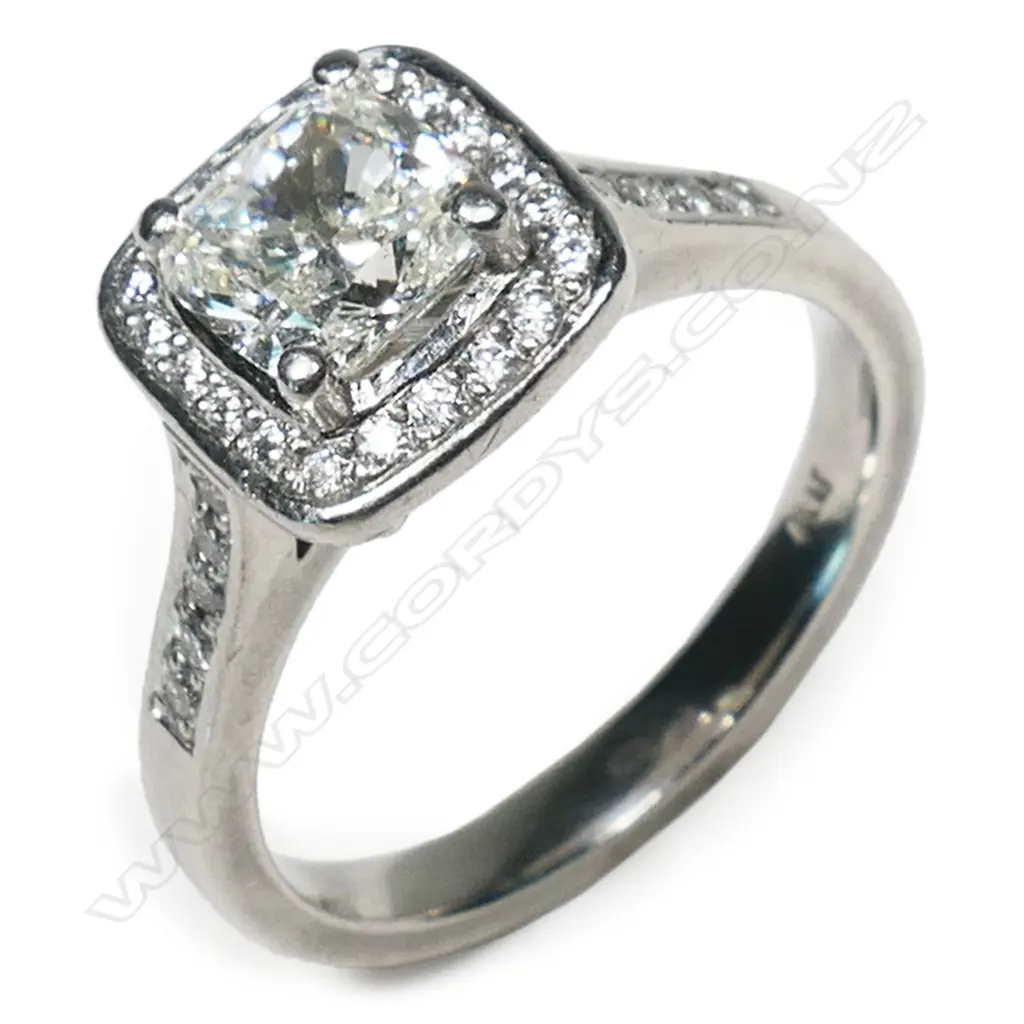 A platinum and diamond ring, Image 1++