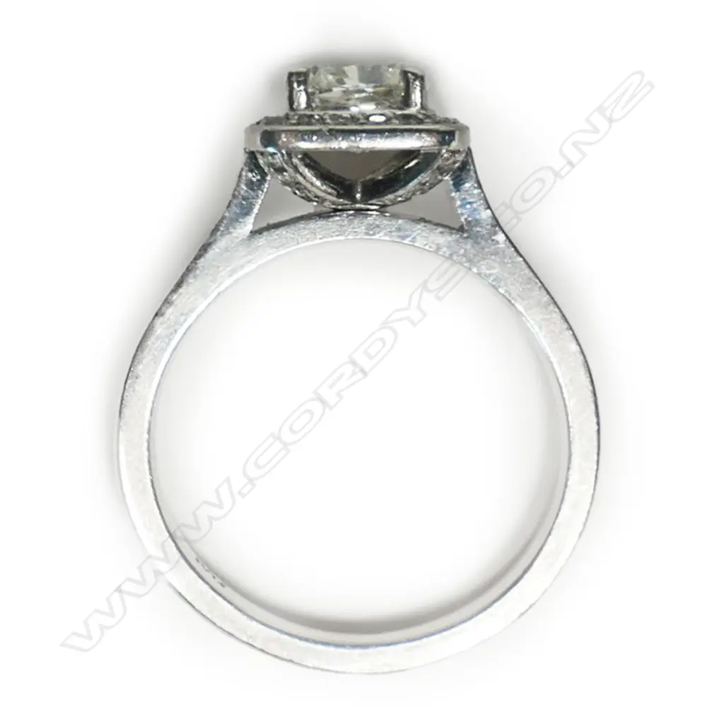 A platinum and diamond ring, Image 1++