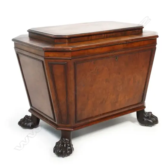 An elegant Regency walnut and mahogany cellarette,