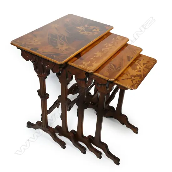 An early 20thC Emile Gallé fine nest of four Art Nouveau marquetry inlaid quartetto tables,
