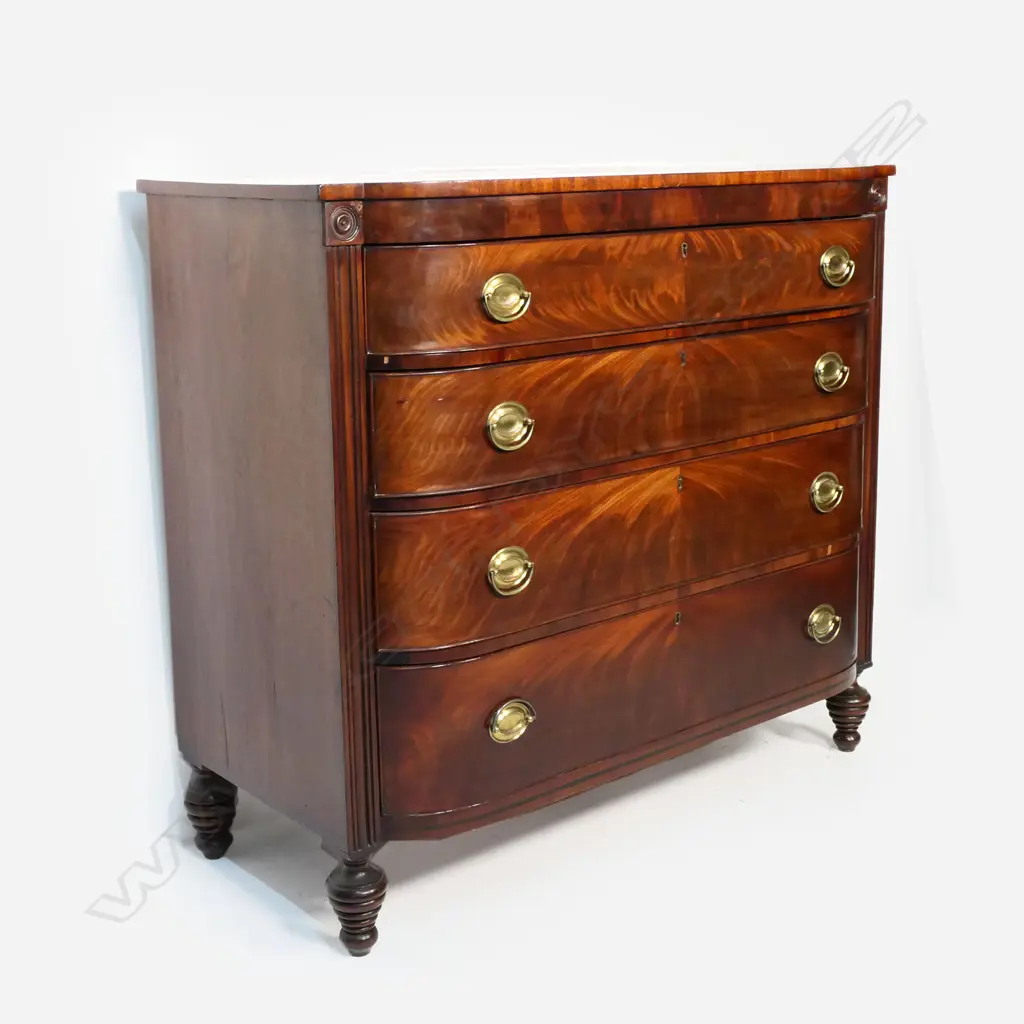 A Regency mahogany barrel fronted four drawer chest, Image 1++