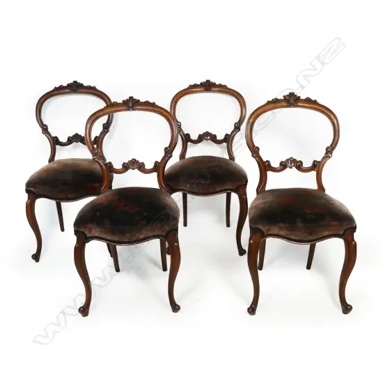 Four Victorian walnut balloon back dining chairs,