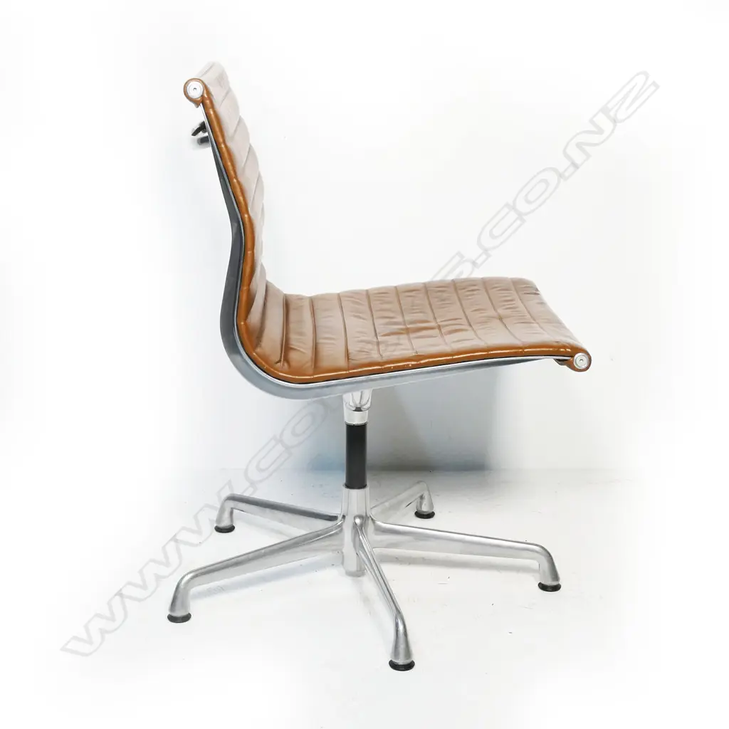 A pair of tan Eames EA330-266 office conference chairs, Image 1++