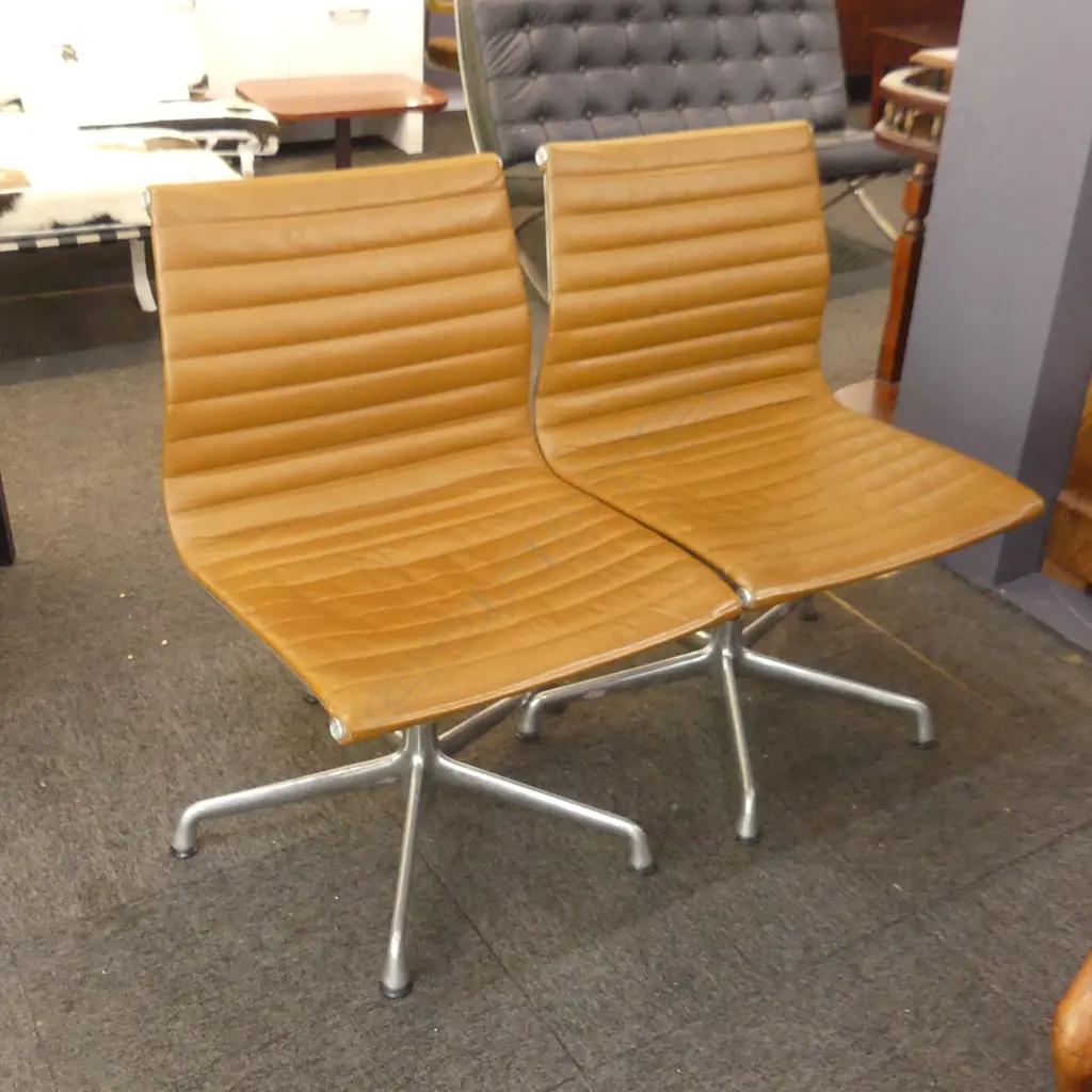 A pair of tan Eames EA330-266 office conference chairs, Image 1++