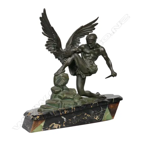 A French Art Deco spelter classical sculpture of Hercules with bird,