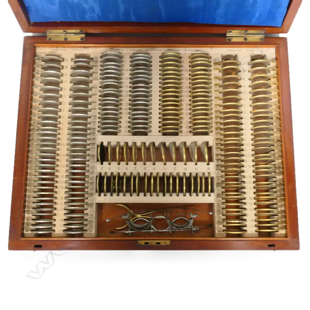 A New Zealand colonial opticians' cased set of prescription test lenses, in fitted mahogany case, Image 1++
