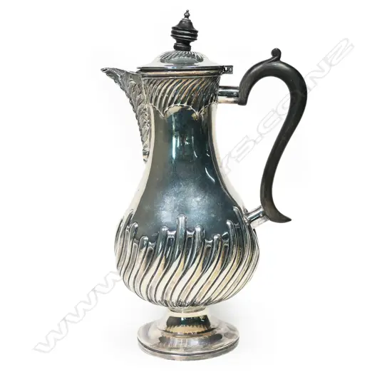 An Edwardian silver claret jug,