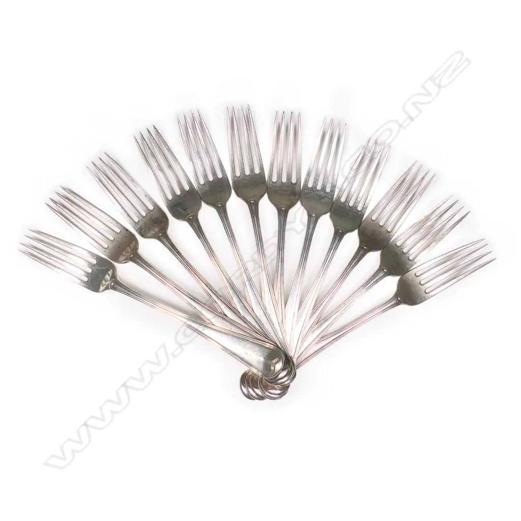 Twelve George III silver table forks, Image 1++