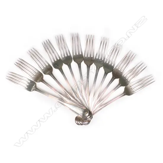 Twelve George III silver table forks,