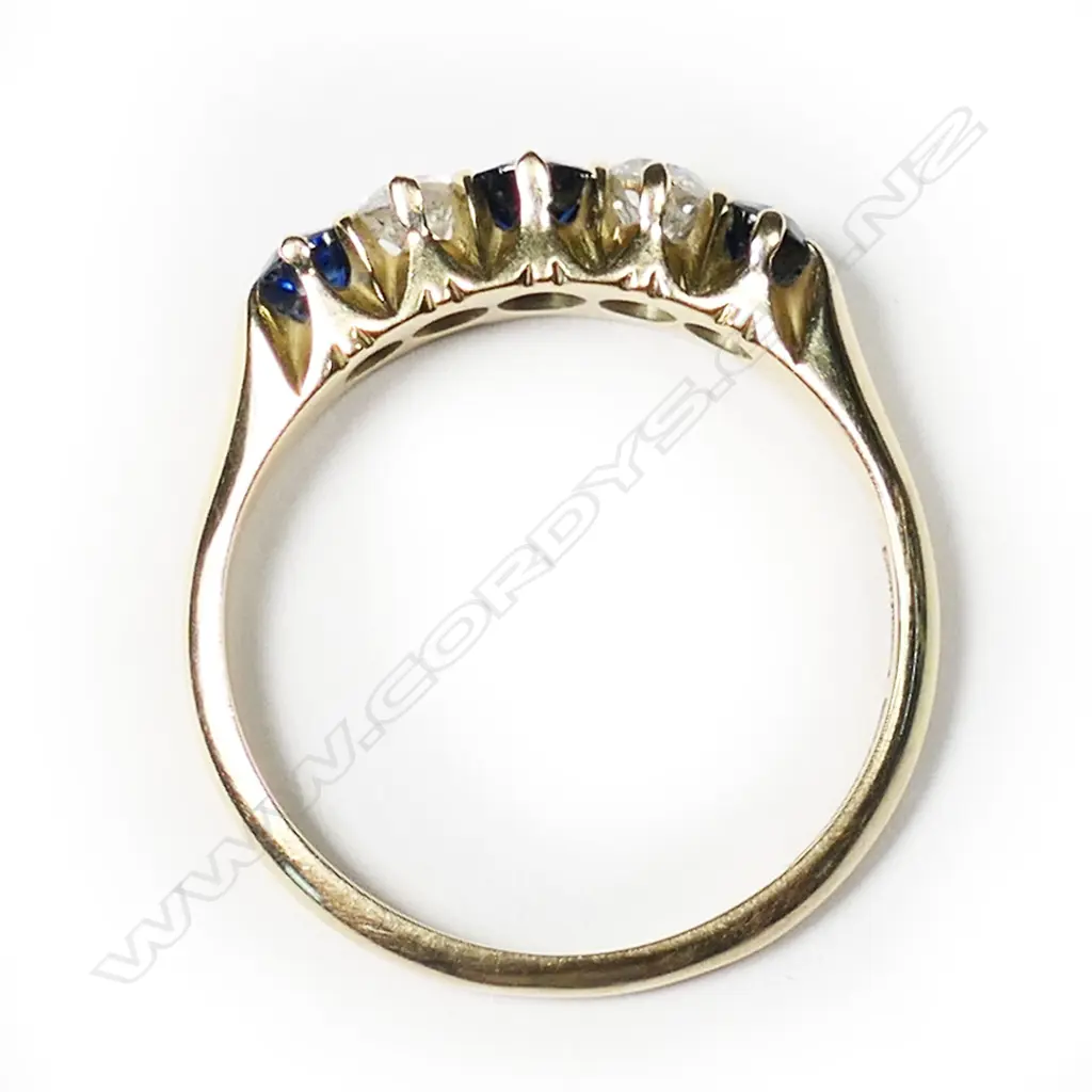 An estate 18ct sapphire and diamond five stone bridge ring, Image 1++