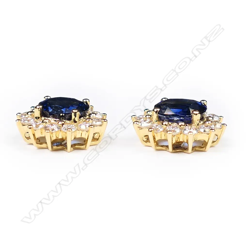 A pair of 18ct yellow gold sapphire and diamond cluster earrings, Image 1++