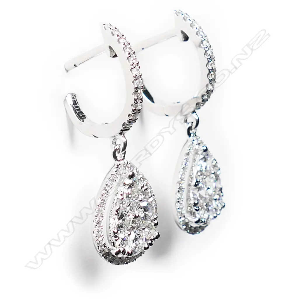 A pair of 18ct white gold and diamond cluster earrings, Image 1++