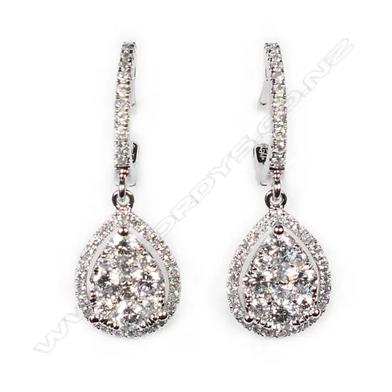 A pair of 18ct white gold and diamond cluster earrings,