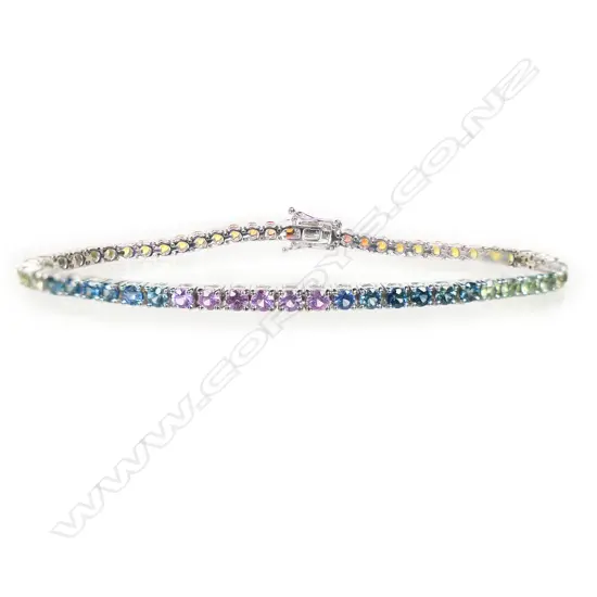 An 18ct white gold rainbow sapphire tennis bracelet,