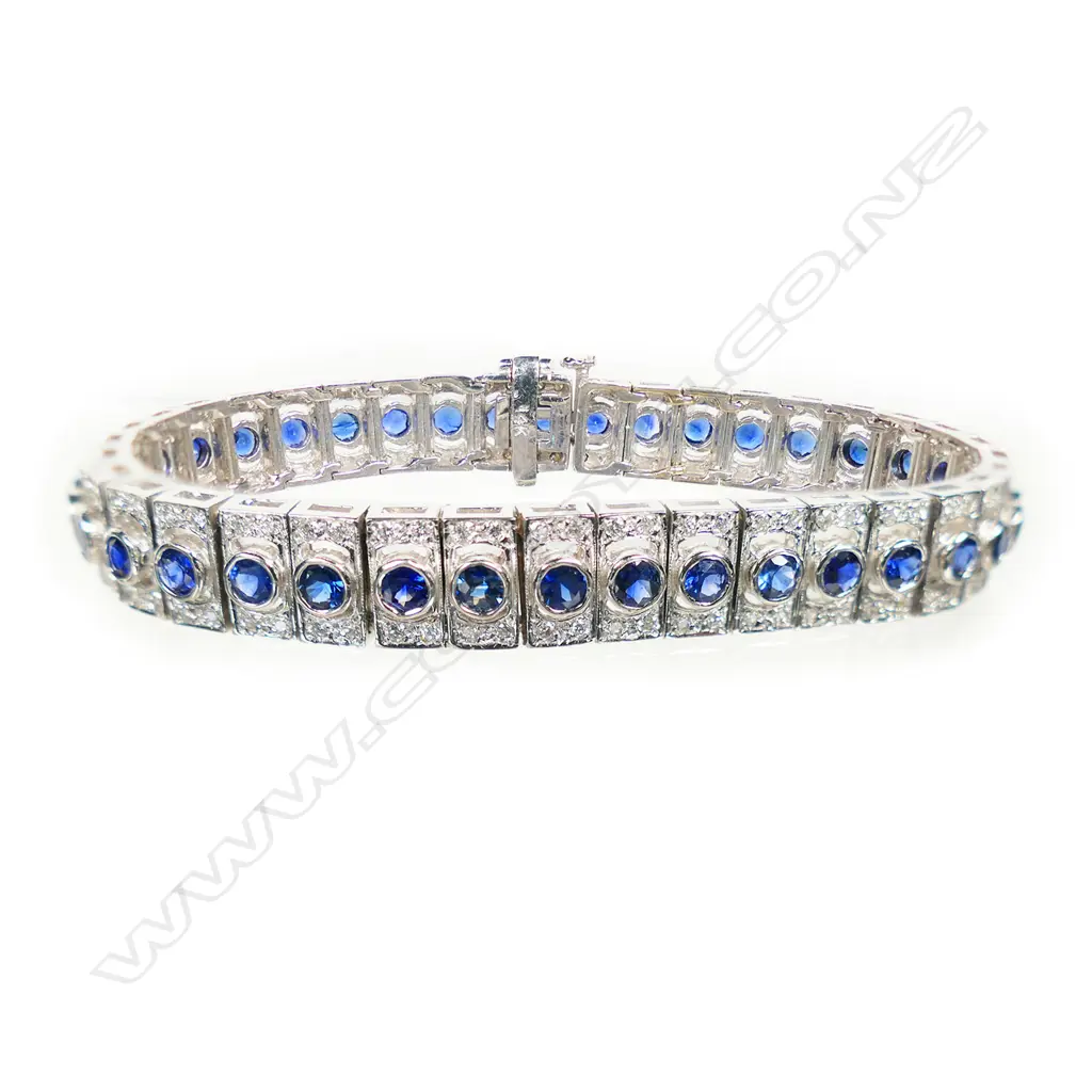 A 14ct white gold diamond and sapphire bracelet, Image 1++