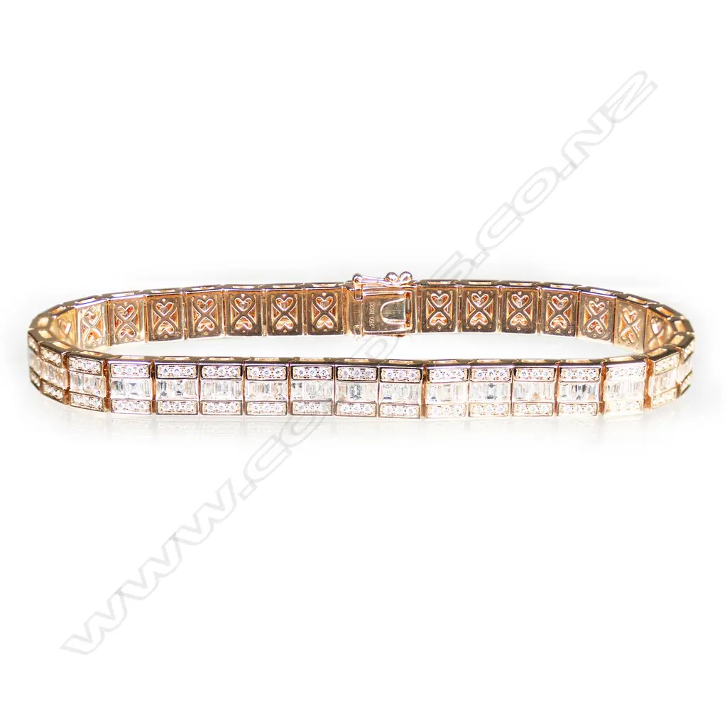 An 18ct rose gold and multi diamond triple row articulated bracelet, Image 1++
