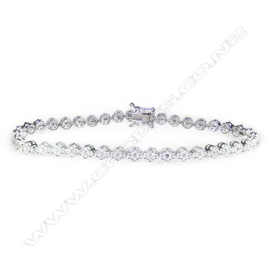An 18ct white gold and diamond tennis type bracelet,