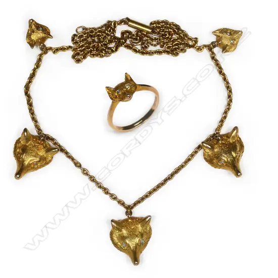 An impressive vintage demi-parure15ct gold and diamond figural set,